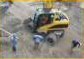 Excavator working on a slope